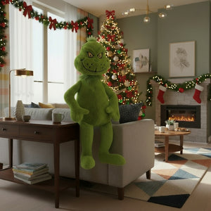 Green character in a festive living room with white Christmas decorations