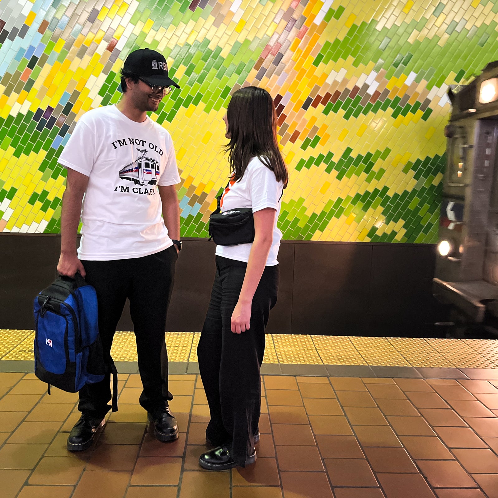 White T-shirt reads I'm not old, I'm Classic in capital black letters. Text sandwiches a large picture of a Silverliner train.